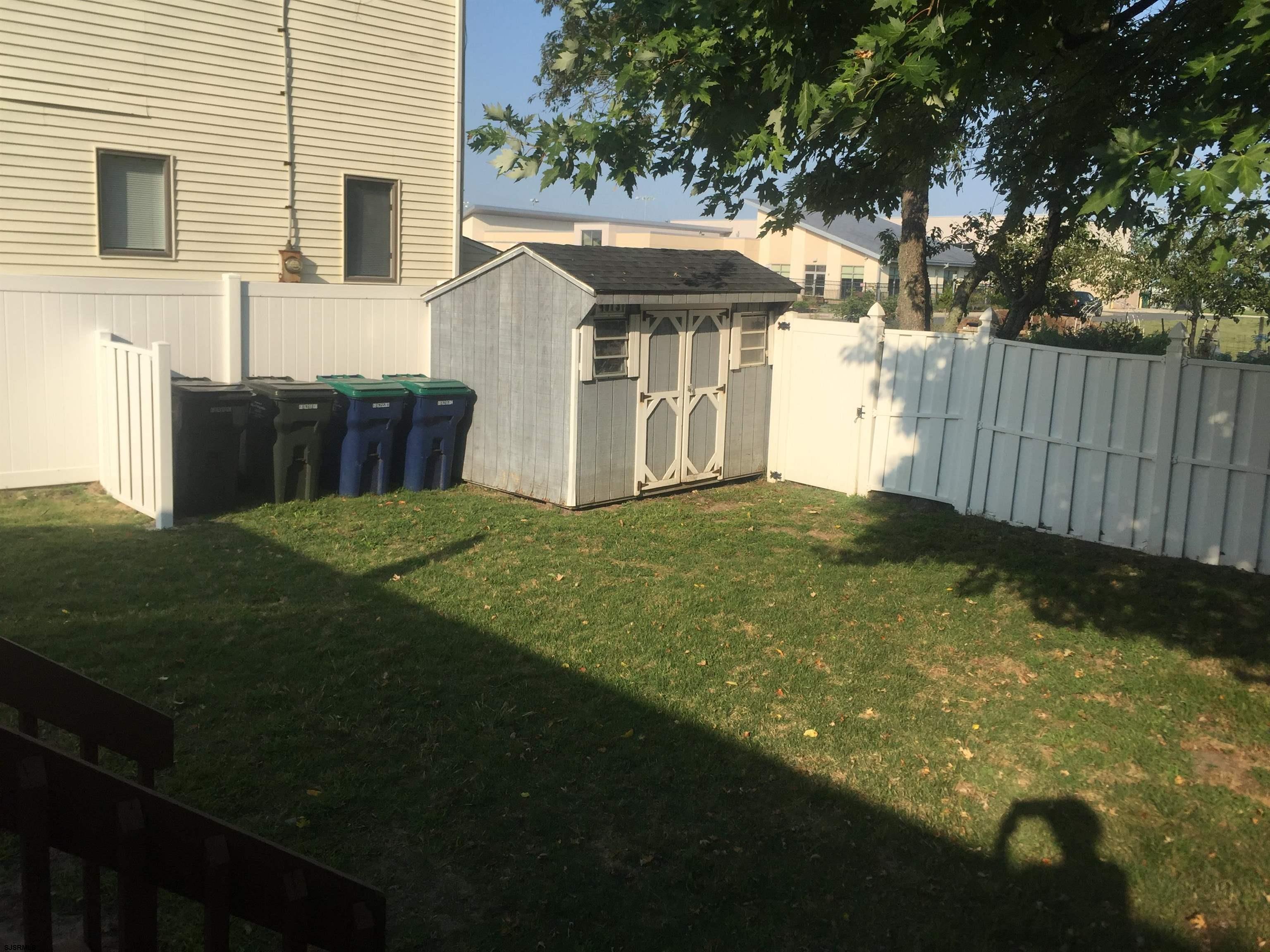 4013 West Brigantine Avenue, Unit 1 Brigantine, NJ 08203 - Photo 6 of 33 a view of a house with a backyard