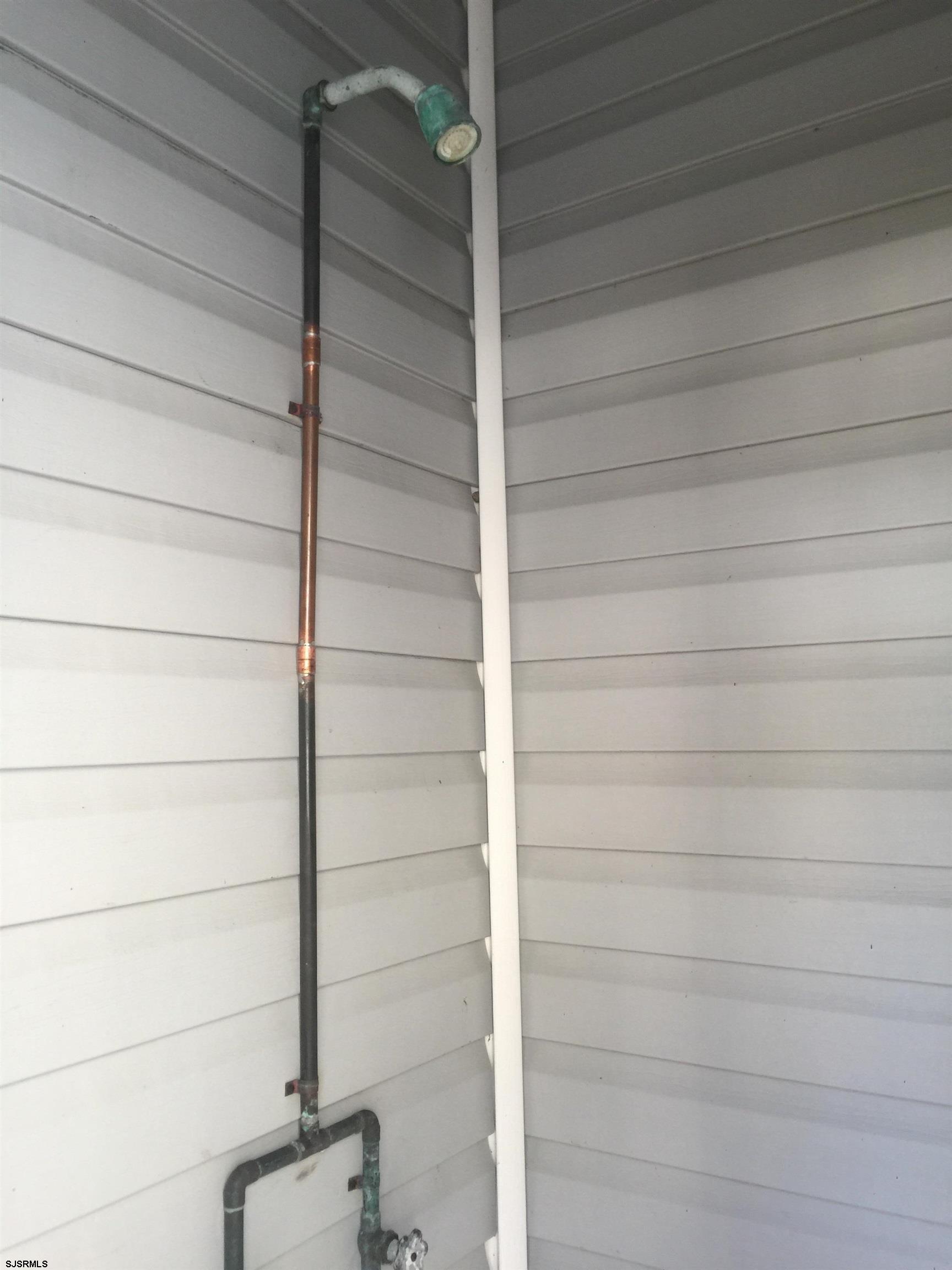 4013 West Brigantine Avenue, Unit 1 Brigantine, NJ 08203 - Photo 7 of 33 a close up view of shower