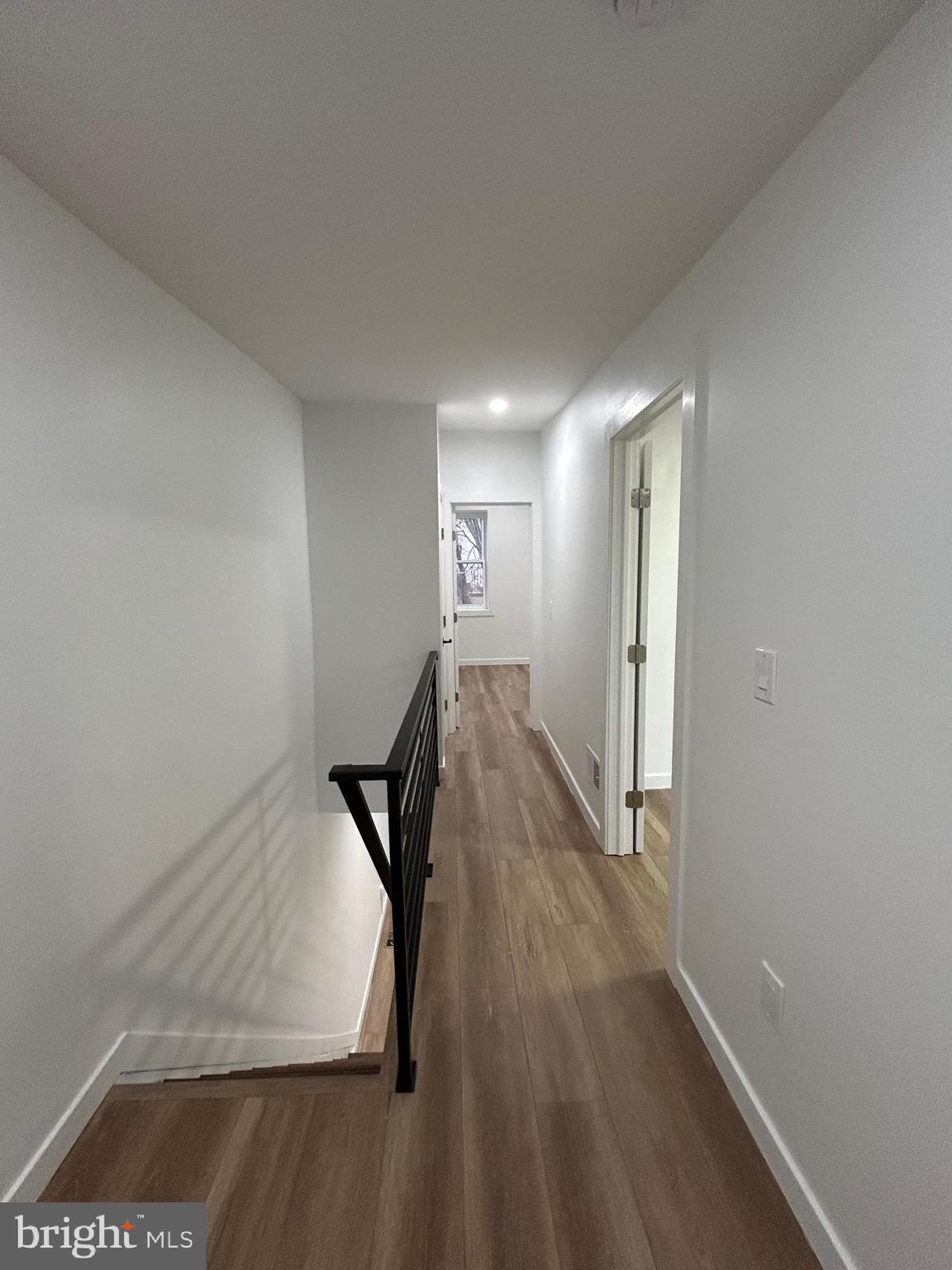 1163 Gerritt Street Philadelphia, PA 19147 - Photo 8 of 11 a view of a hallway with wooden floor