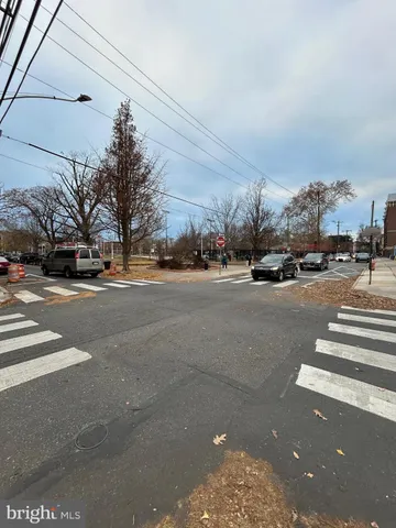 a terrace with outdoor seating and city view