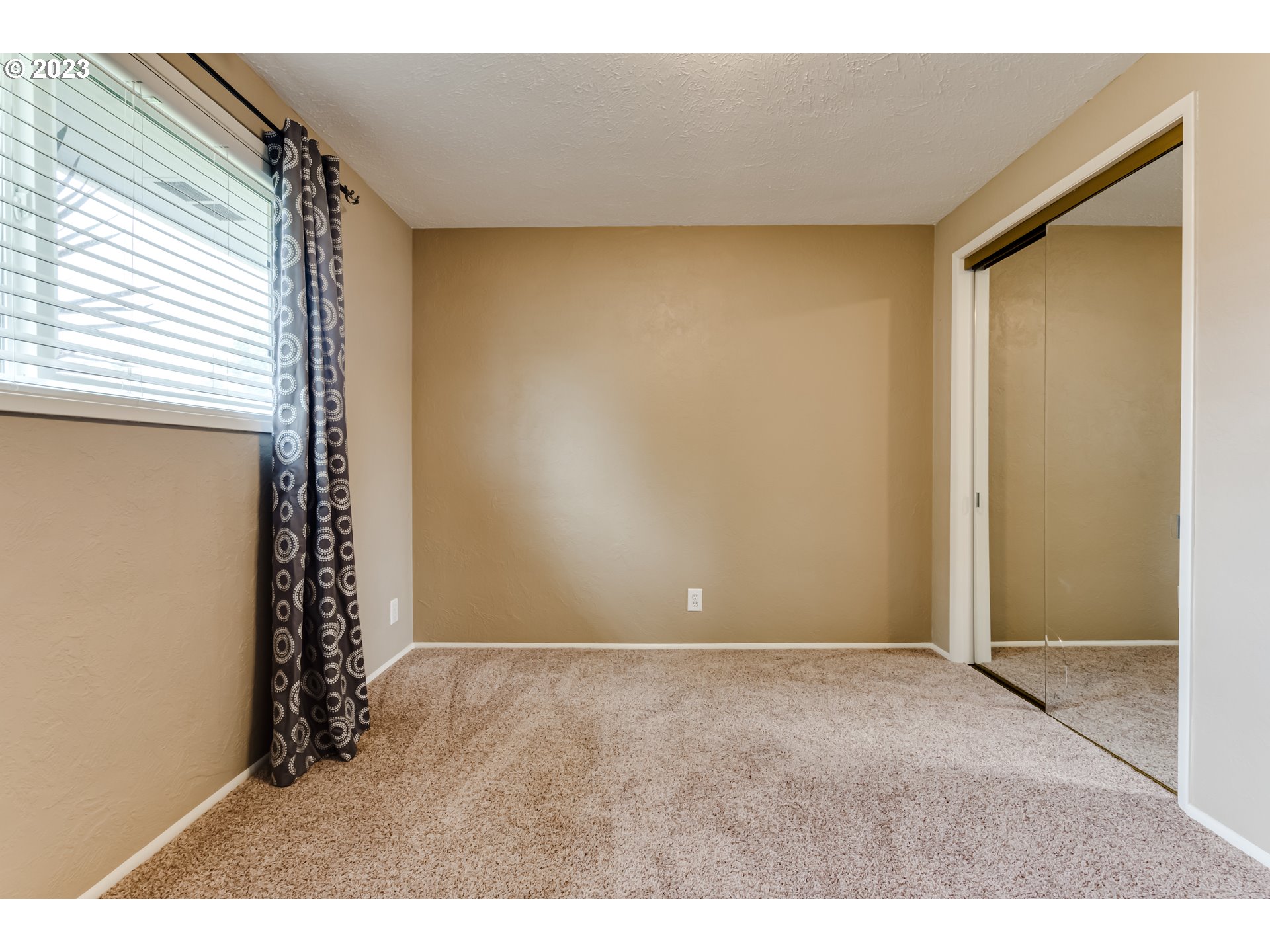 2407 17th Street Springfield, OR 97477 - Photo 15 of 40 a view of an empty room and window