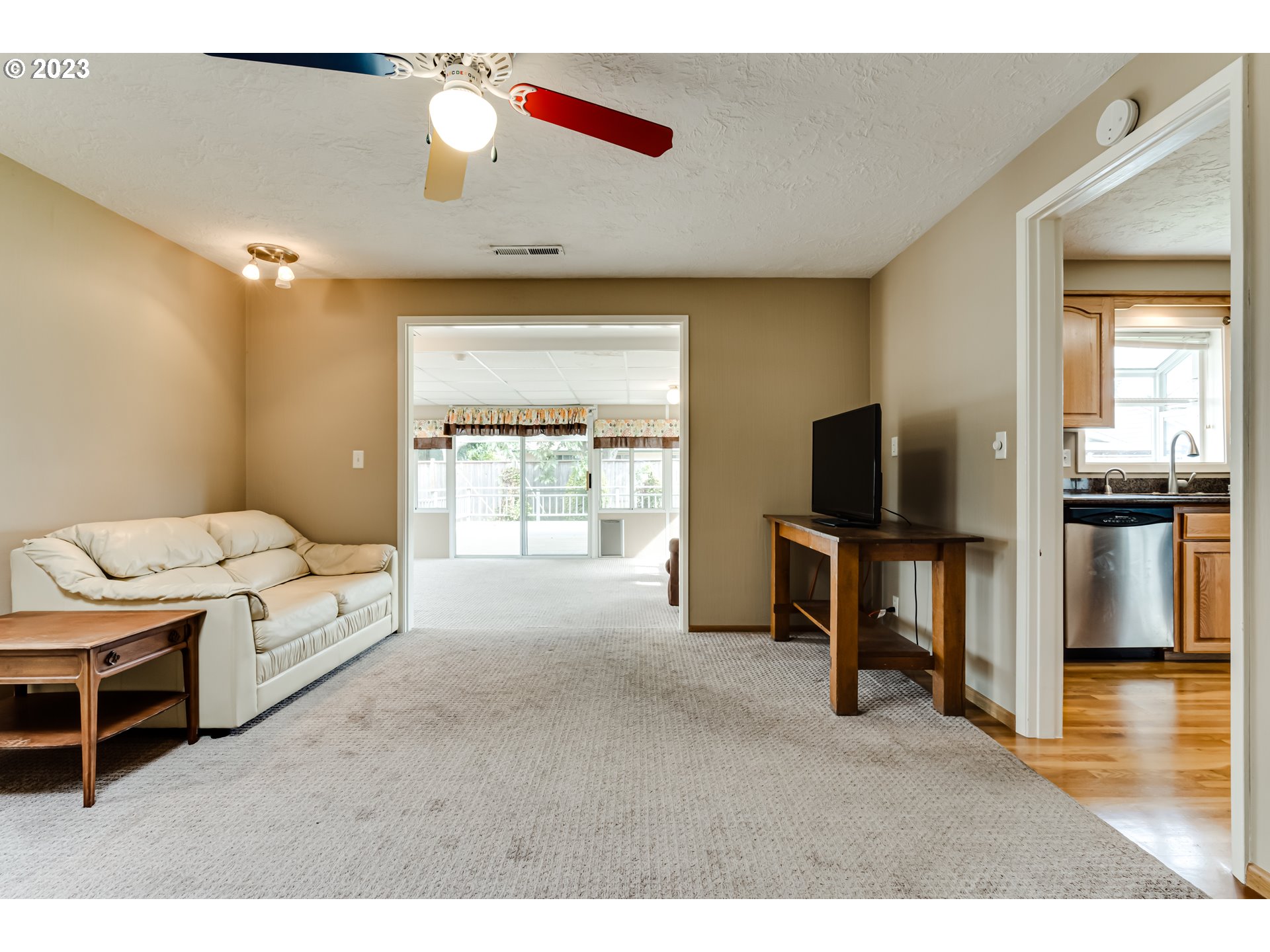 2407 17th Street Springfield, OR 97477 - Photo 25 of 40 a living room with furniture and a flat screen tv