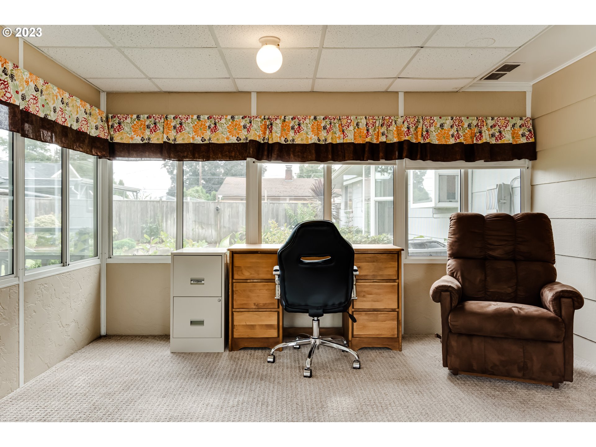 2407 17th Street Springfield, OR 97477 - Photo 27 of 40 a living room with furniture and a large window
