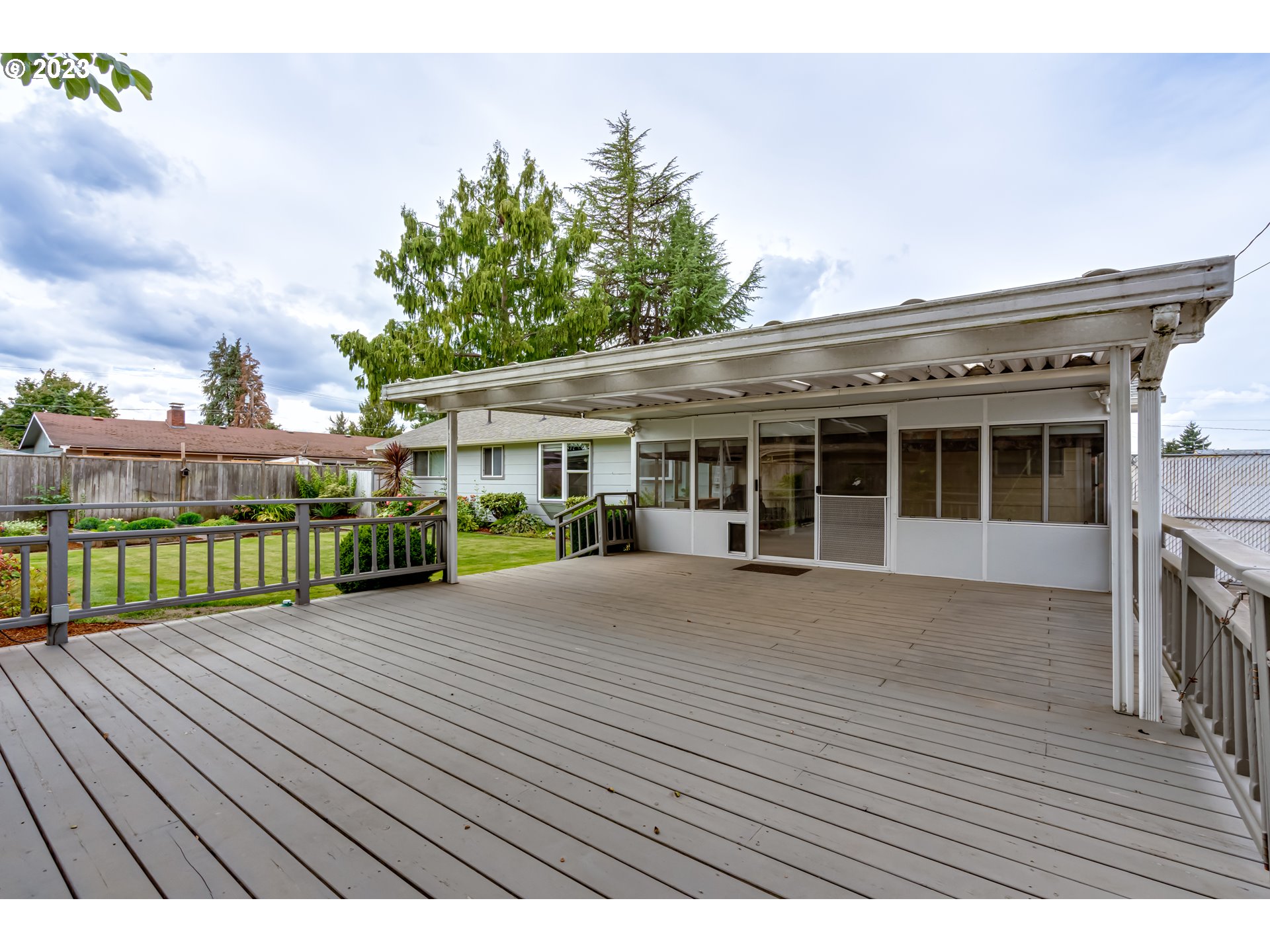 2407 17th Street Springfield, OR 97477 - Photo 33 of 40 a view of a house with a wooden deck