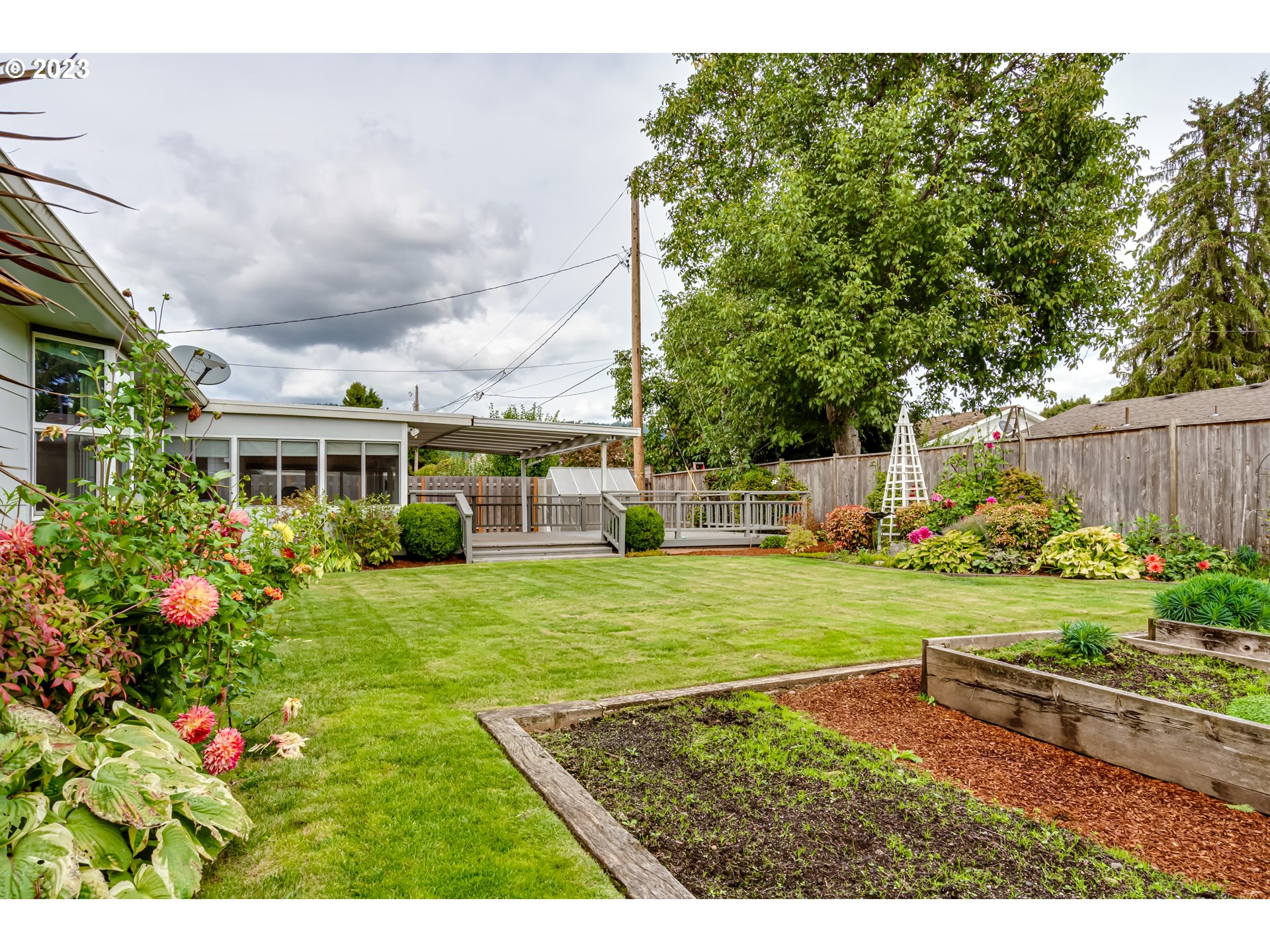 2407 17th Street Springfield, OR 97477 - Photo 36 of 40 a view of an house with backyard space and garden