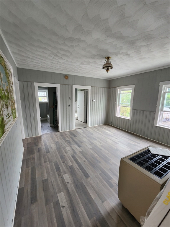 351 Tecumseh Street, Unit 2 Fall River, MA 02721 - Photo 5 of 14 a bedroom with bed and window