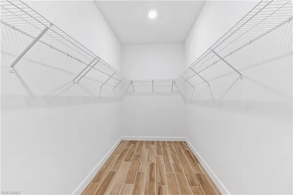 a view of a room with racks on the wall