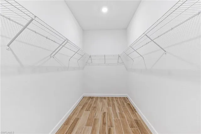 a view of a room with racks on the wall