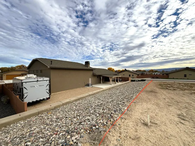a view of a roof and car parked
