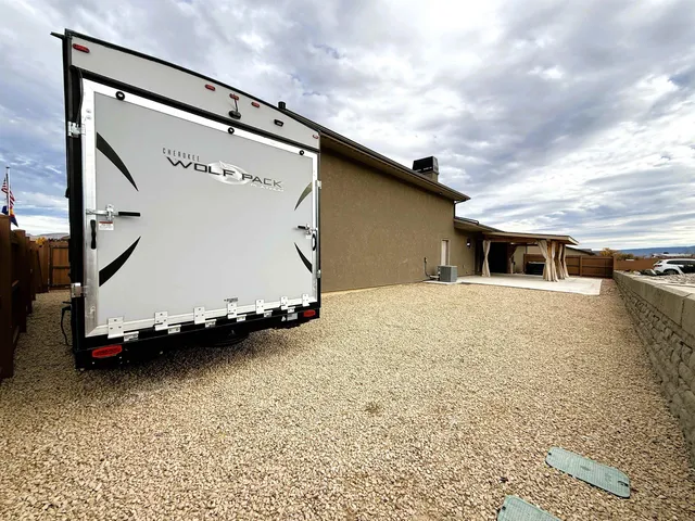 a house with trees in the background