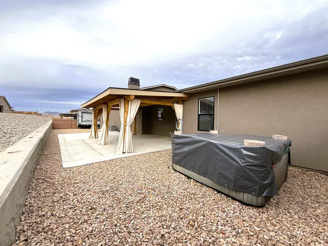 a front view of a house with parking space