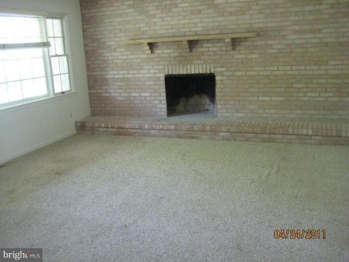 10005 German Road Ellicott City, MD 21042 - Photo 4 of 20 a view of a livingroom with a fireplace