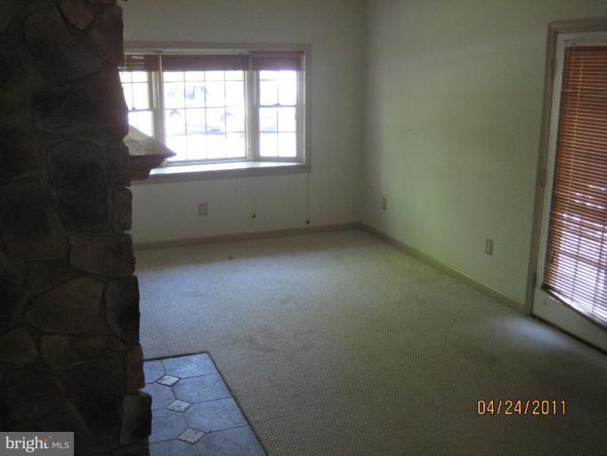 10005 German Road Ellicott City, MD 21042 - Photo 7 of 20 an empty room with windows
