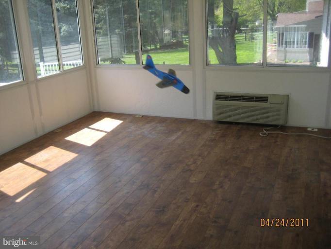 10005 German Road Ellicott City, MD 21042 - Photo 9 of 20 a view of an empty room with a window