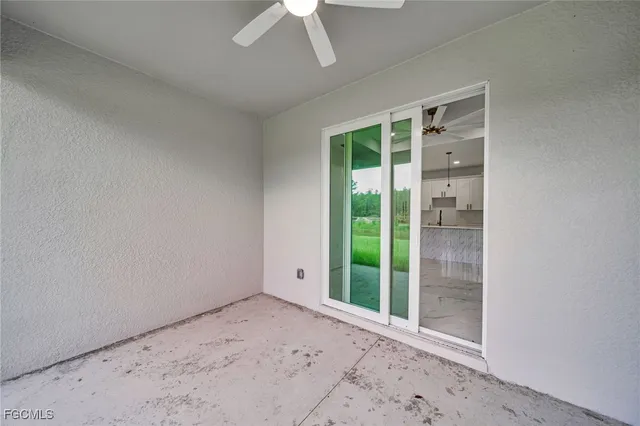 a view of a room with a large window