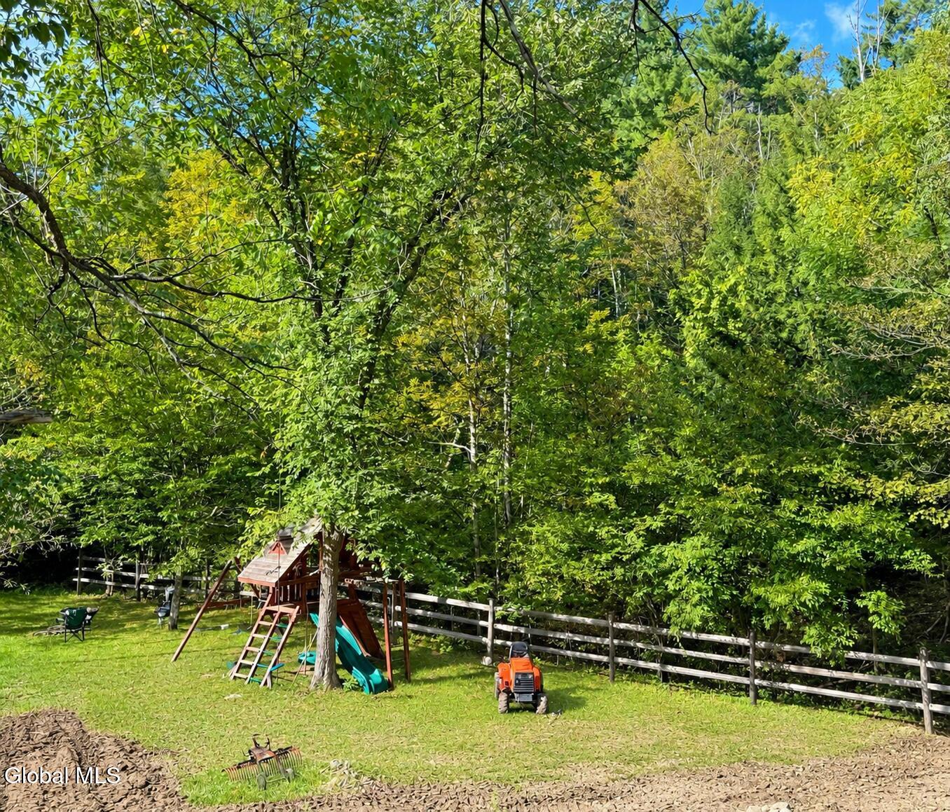 660 Jones Hollow Road Petersburgh, NY 12138 - Photo 15 of 19 Left Side of Yard with Large Play Area