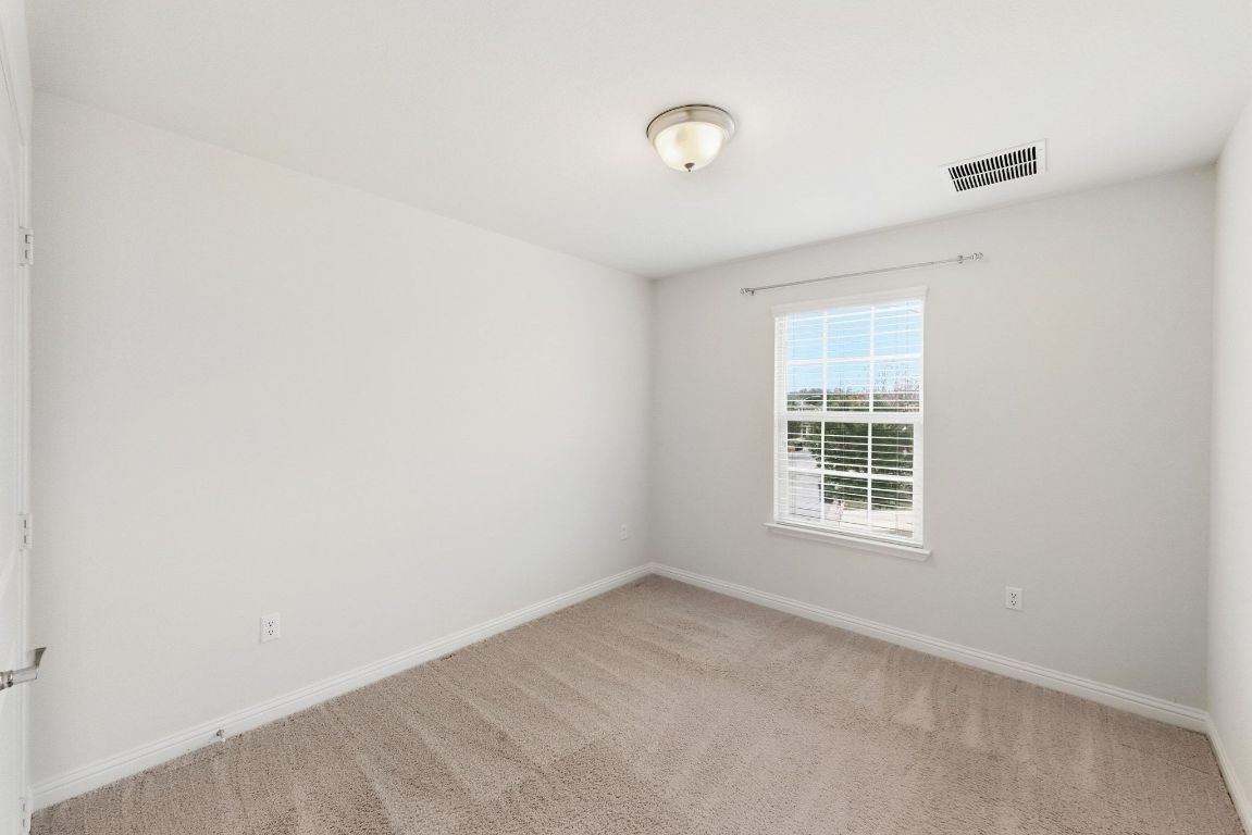 9415 Tanager Way Austin, TX 78748 - Photo 16 of 25 an empty room with a window