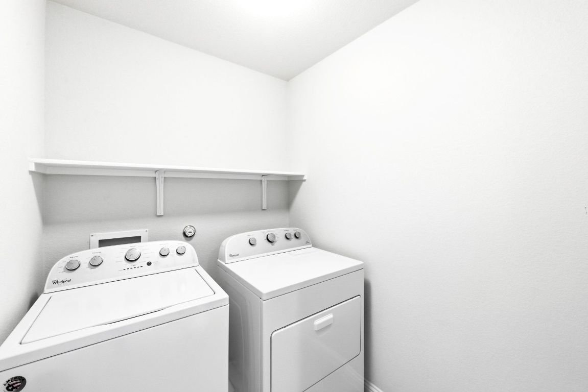 9415 Tanager Way Austin, TX 78748 - Photo 17 of 25 a utility room with dryer and washer