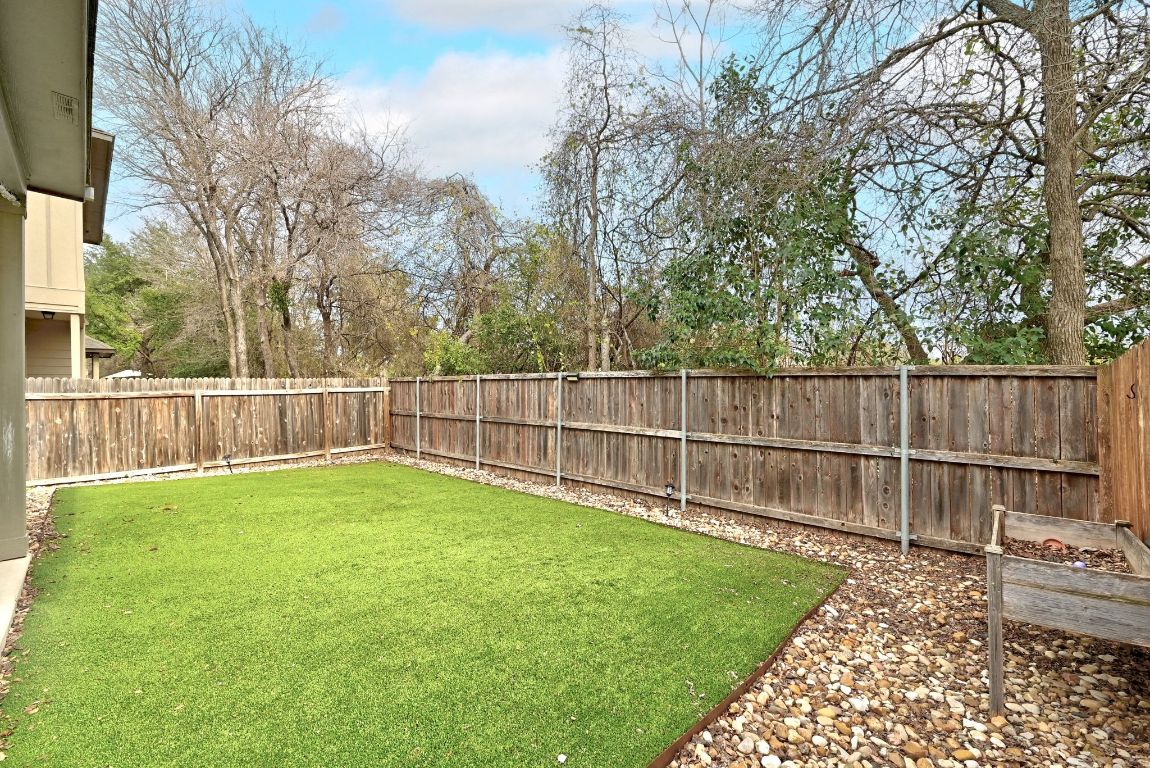 9415 Tanager Way Austin, TX 78748 - Photo 24 of 25 a view of a backyard with a small cabin