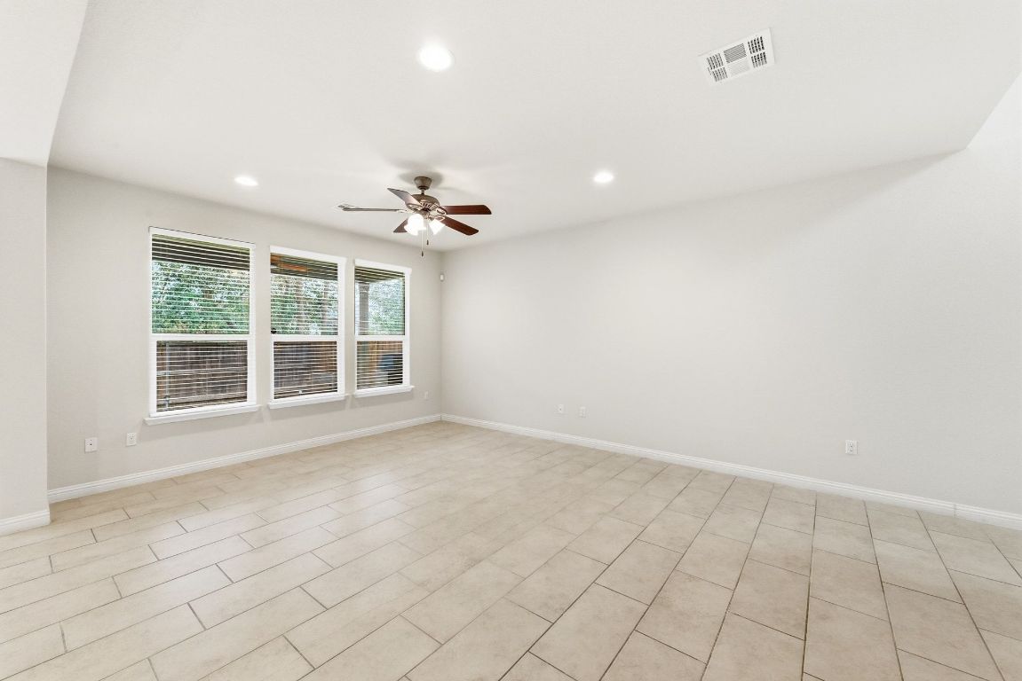 9415 Tanager Way Austin, TX 78748 - Photo 3 of 25 a view of an empty room with a window