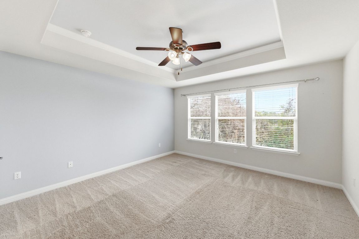 9415 Tanager Way Austin, TX 78748 - Photo 9 of 25 a view of an empty room with a window