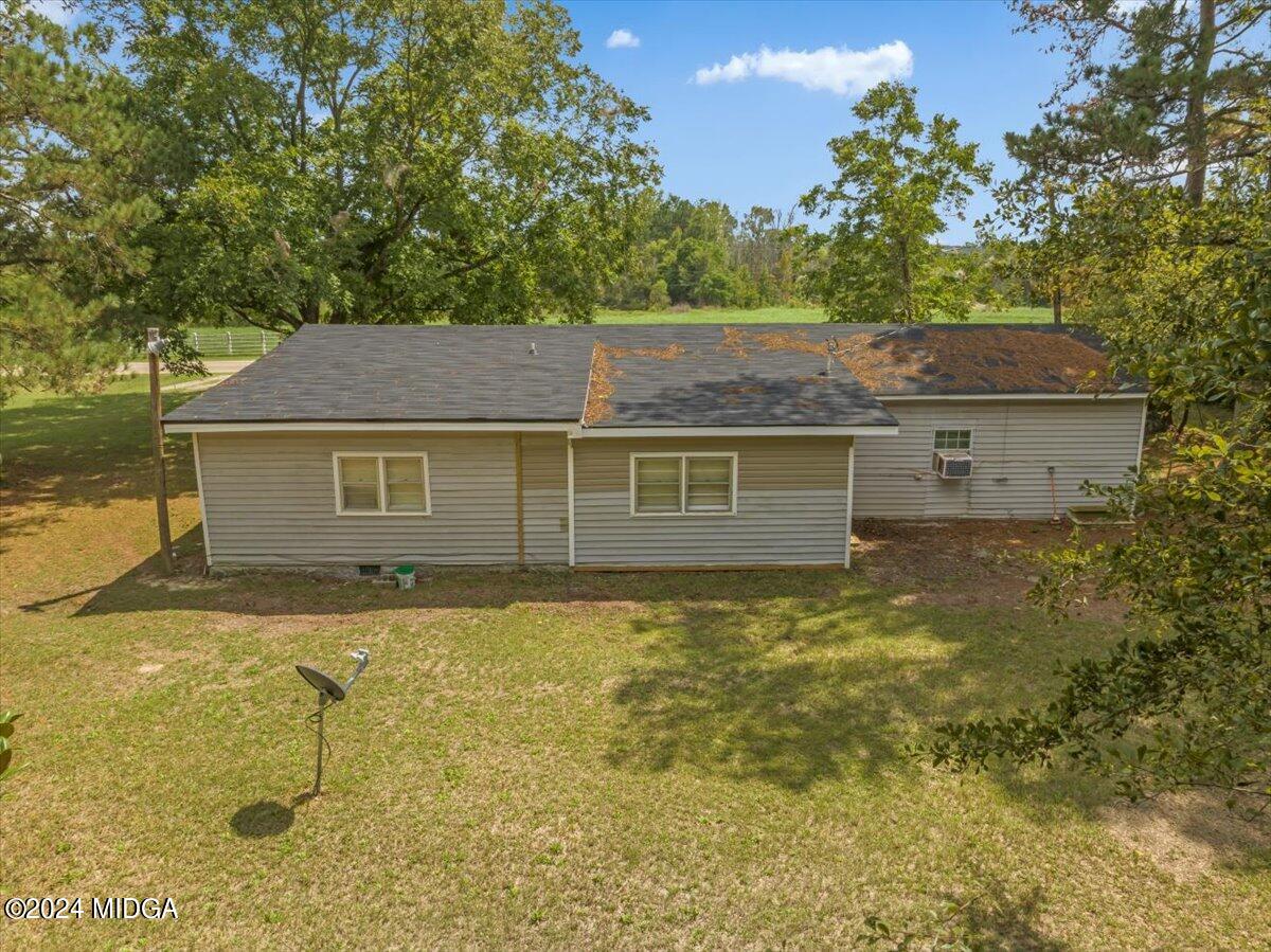 389 Hudson Jones Road Cochran, GA 31014 - Photo 21 of 29 a view of a house with a yard