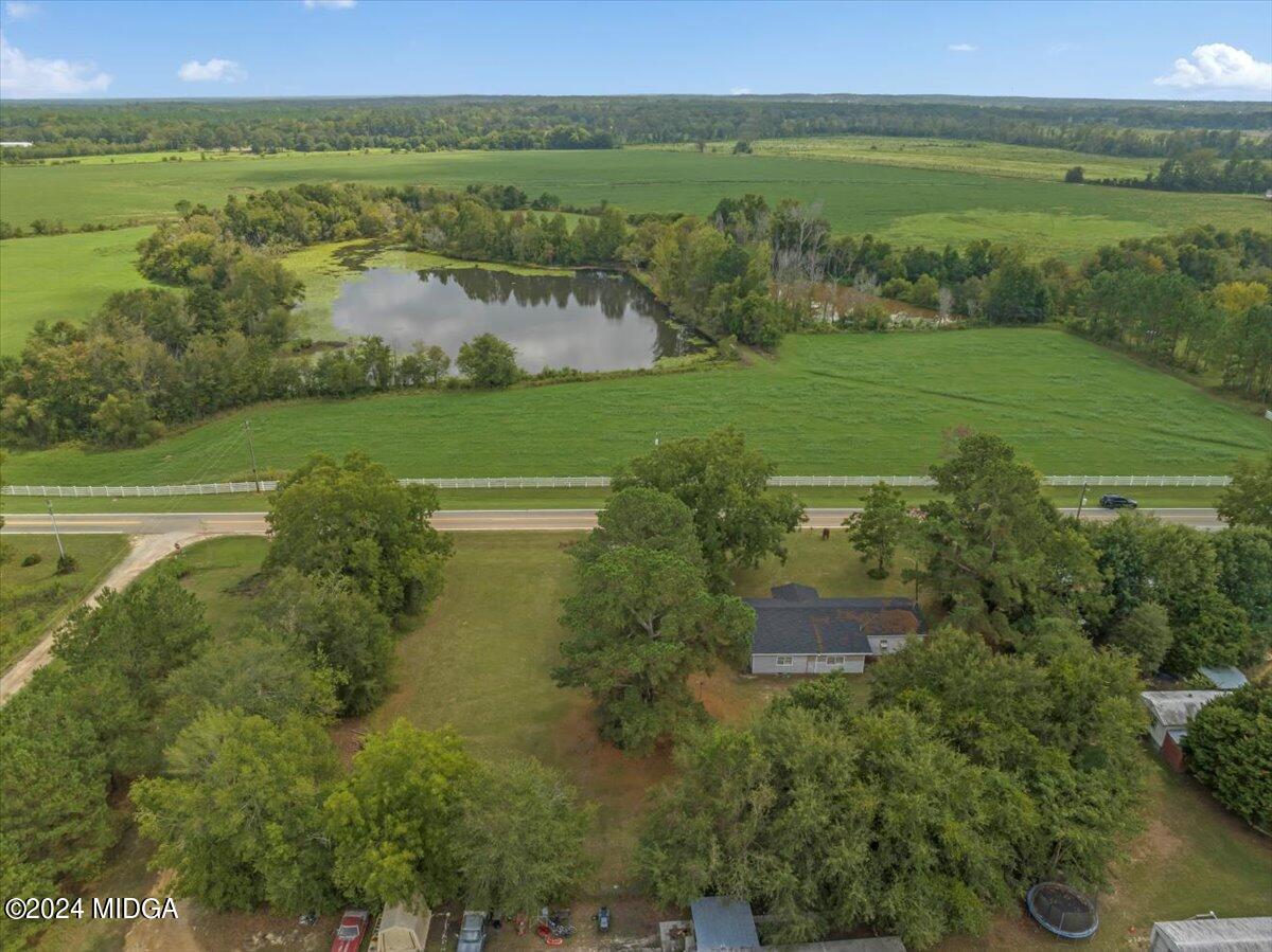 389 Hudson Jones Road Cochran, GA 31014 - Photo 28 of 29 a view of a green field with an ocean view