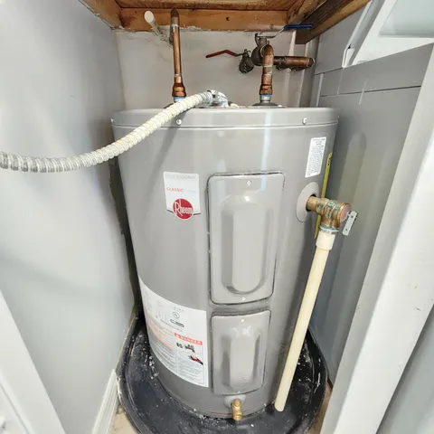 a view of a wooden door with a yard