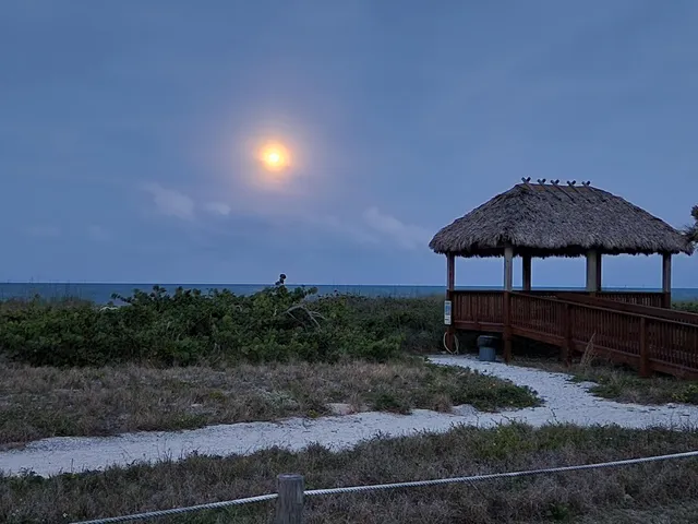 a terrace of a house with outdoor seating