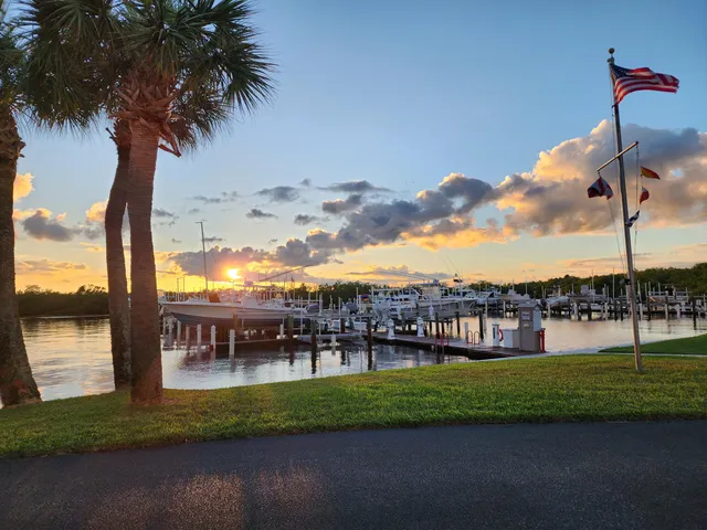 a sign that is next to a road