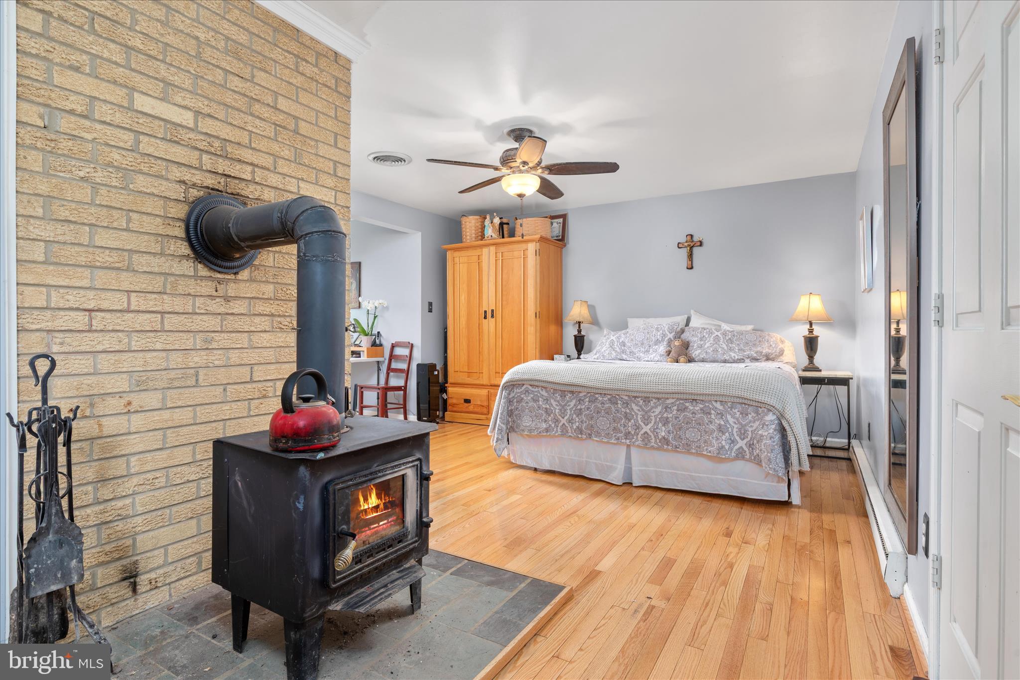 515 Old Fire Tower Road Capon Bridge, WV 26711 - Photo 40 of 117 Primary Bedroom with Wood Stove