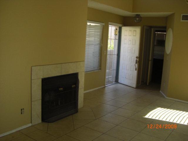 2834 South Ext Road, Unit 2110 Mesa, AZ 85210 - Photo 2 of 15 FAMILY ROOM WITH FIREPLACE