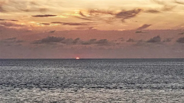 a view of a balcony with a swing