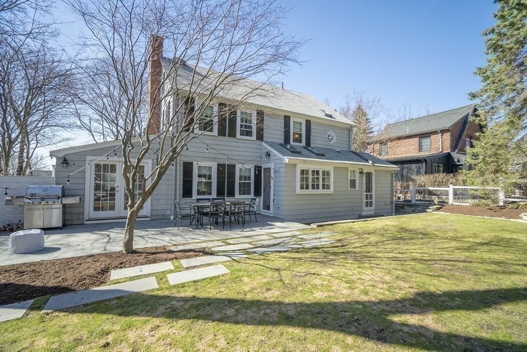 22 Allen Road Winchester, MA 01890 - Photo 35 of 38 a swimming pool with the trees in the background