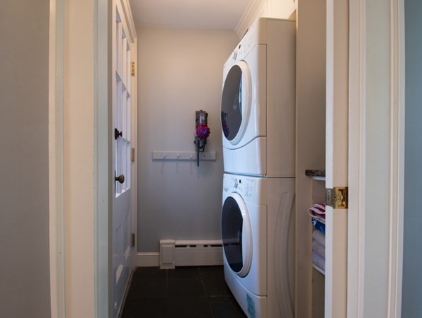 22 Allen Road Winchester, MA 01890 - Photo 8 of 38 a utility room with dryer and washer