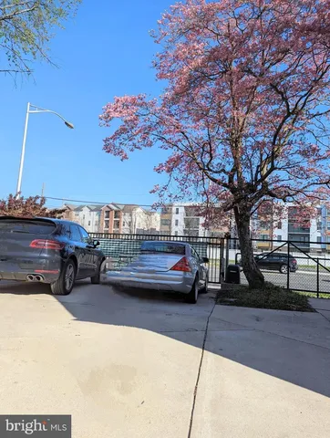 a view of street with parked cars