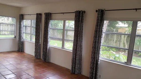 a view of an empty room and window