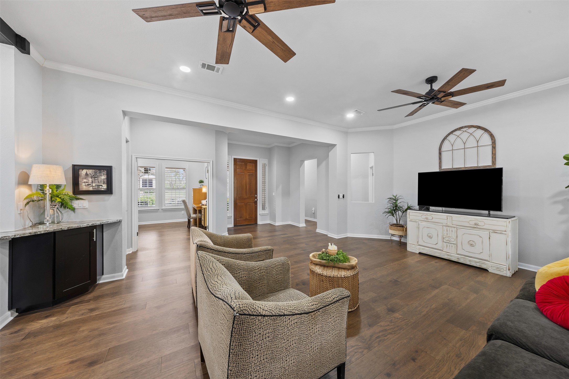 144 Stetson Trail Georgetown, TX 78633 - Photo 11 of 39 a living room with furniture and a flat screen tv