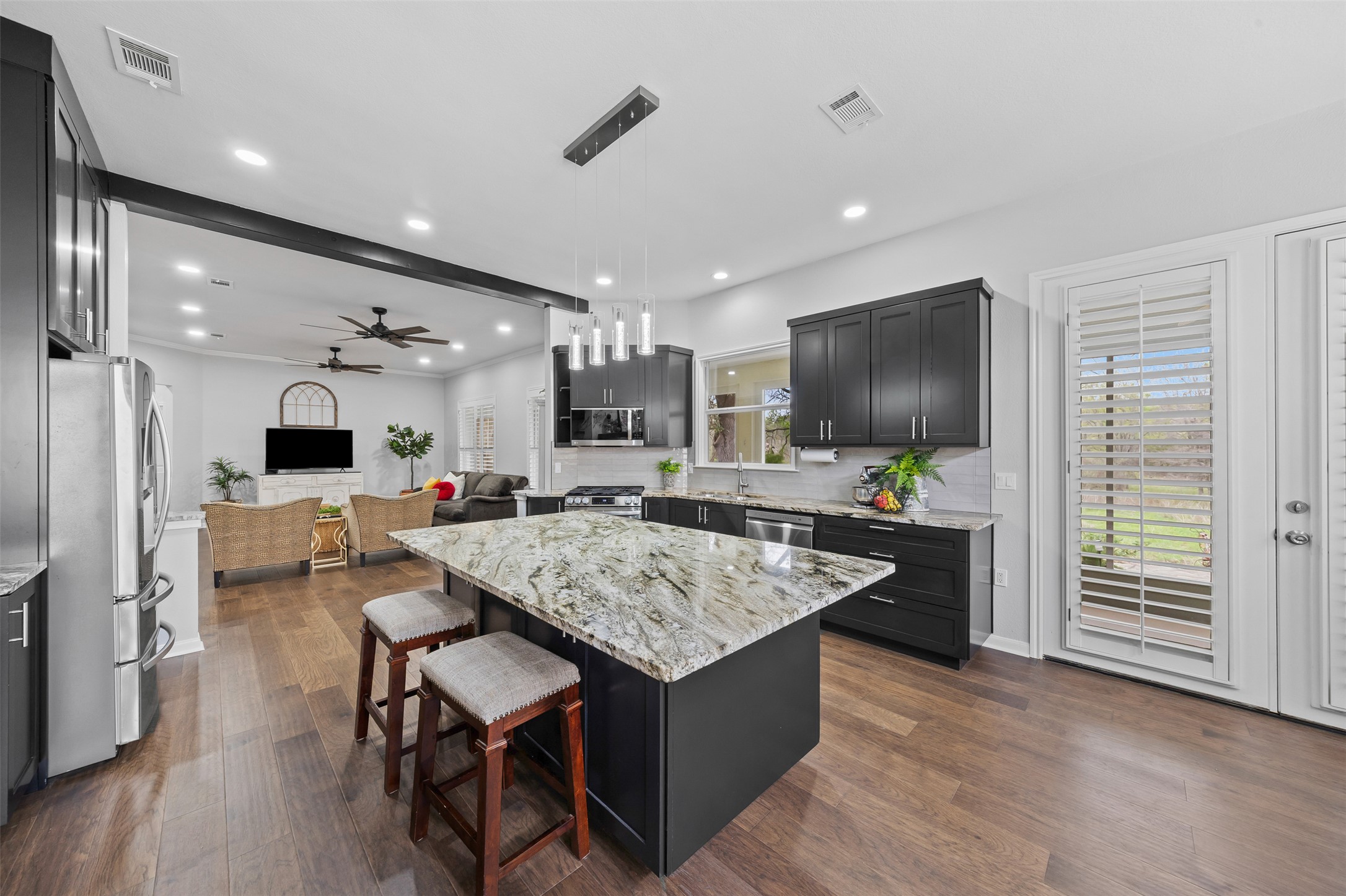 144 Stetson Trail Georgetown, TX 78633 - Photo 37 of 39 a kitchen with a table and chairs in it
