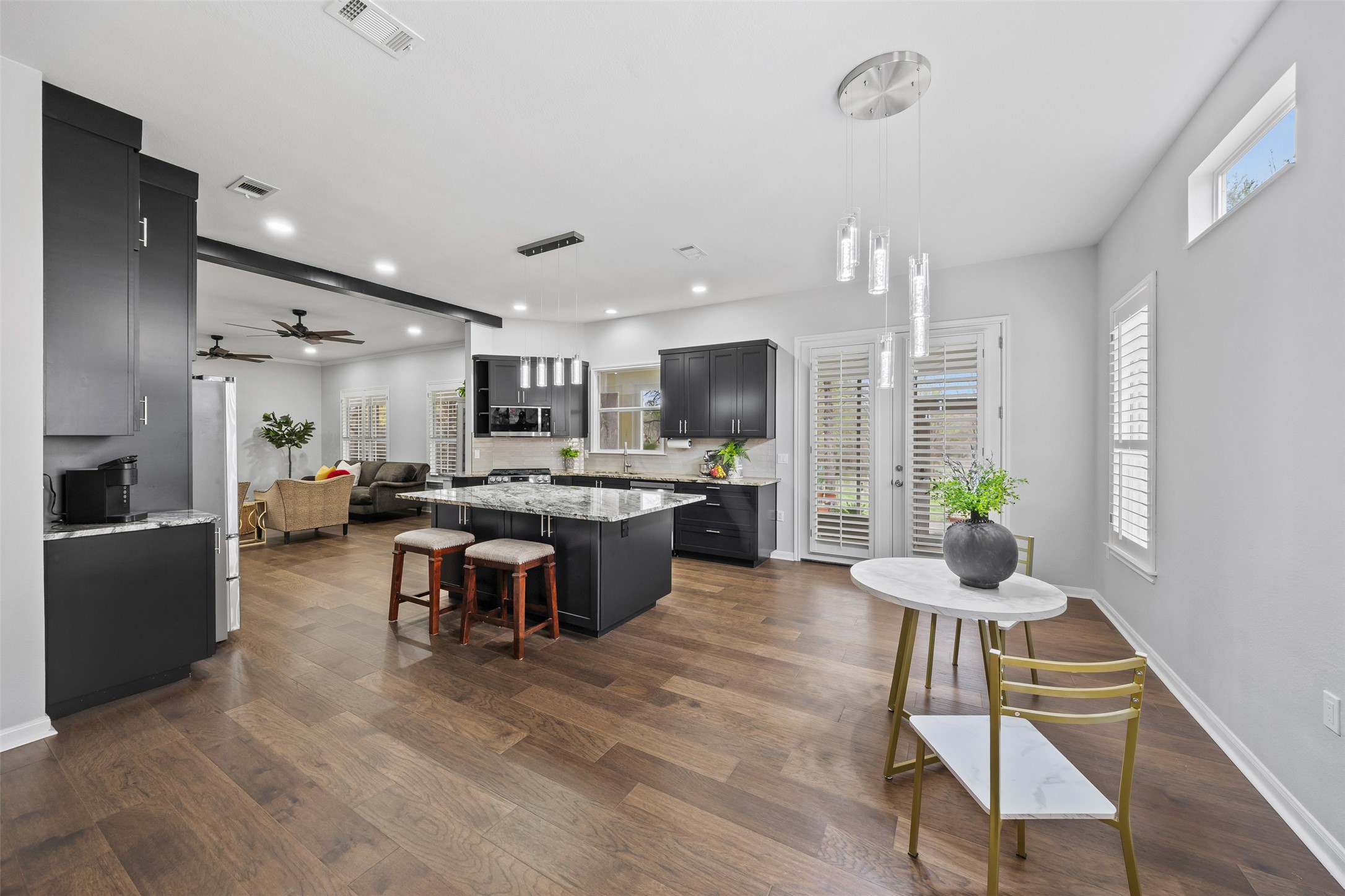 144 Stetson Trail Georgetown, TX 78633 - Photo 38 of 39 a living room with lots of furniture and kitchen view