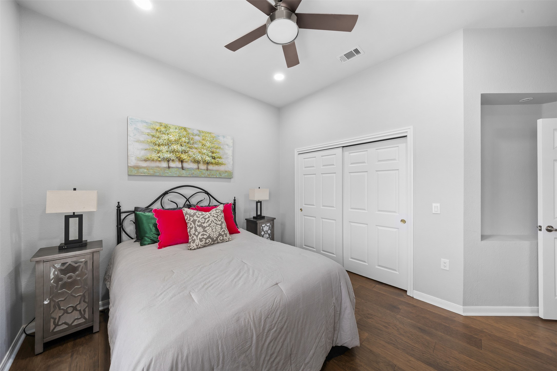 144 Stetson Trail Georgetown, TX 78633 - Photo 21 of 39 a bedroom with a bed and a chandelier