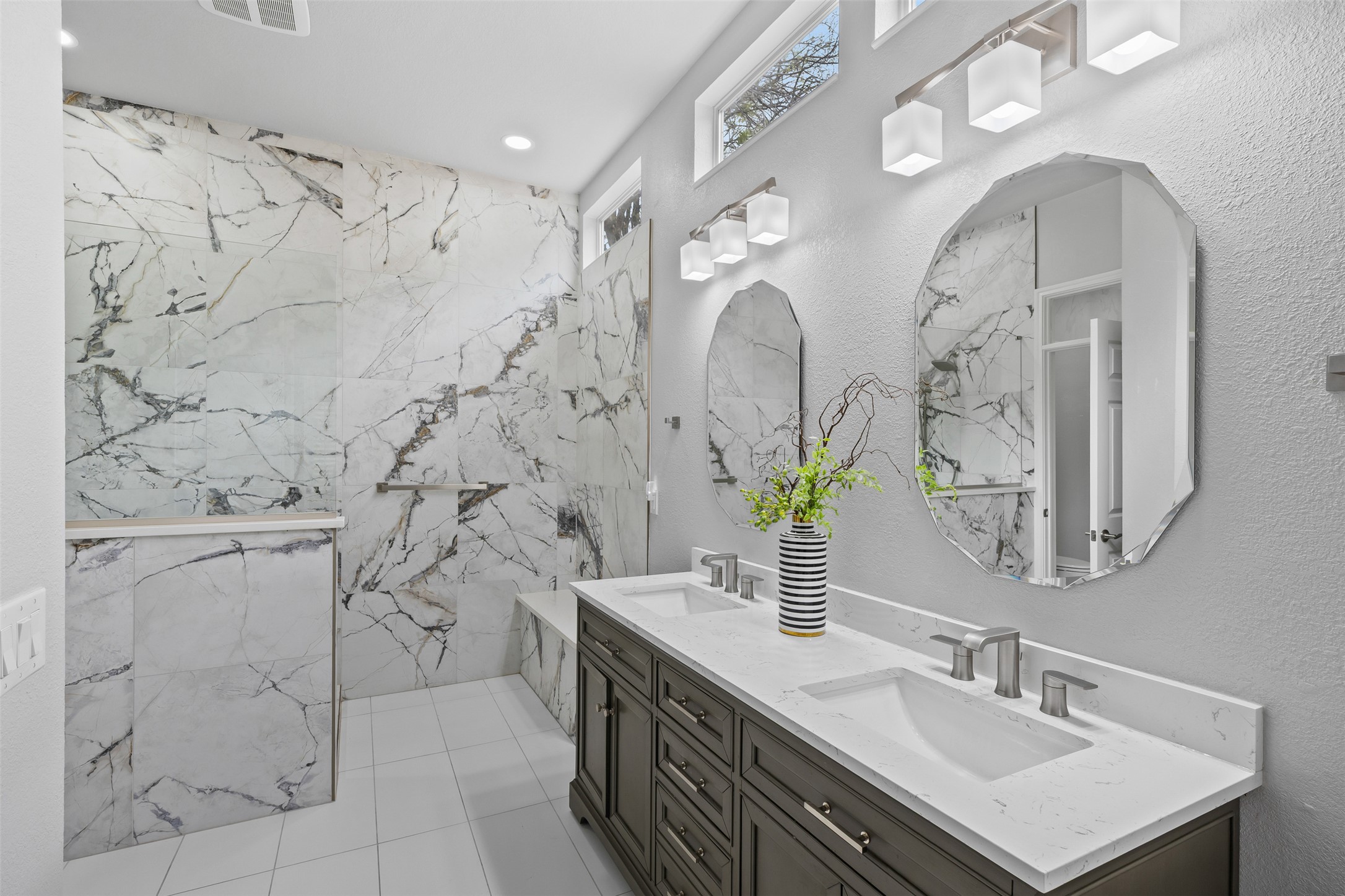 144 Stetson Trail Georgetown, TX 78633 - Photo 26 of 39 a bathroom with a sink vanity granite and a mirror