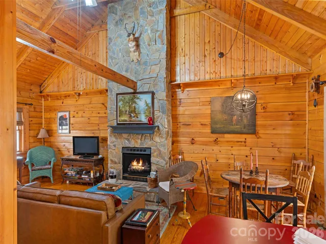 a view of a dining room with furniture and window