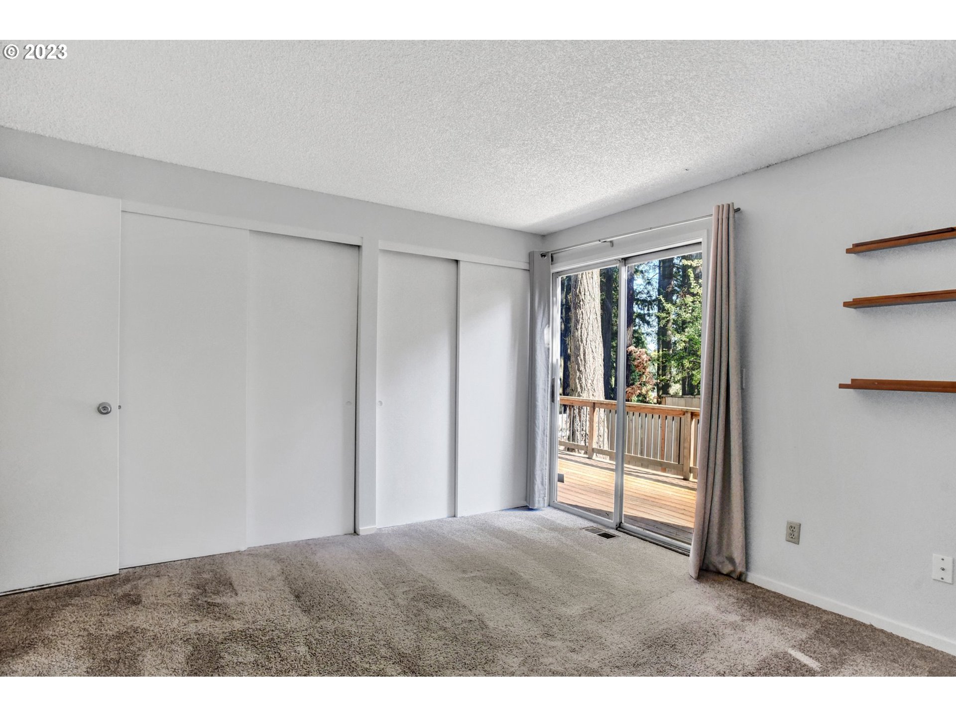6160 Southwest Heights Lane Beaverton, OR 97007 - Photo 21 of 40 a big room with closet and wooden floor
