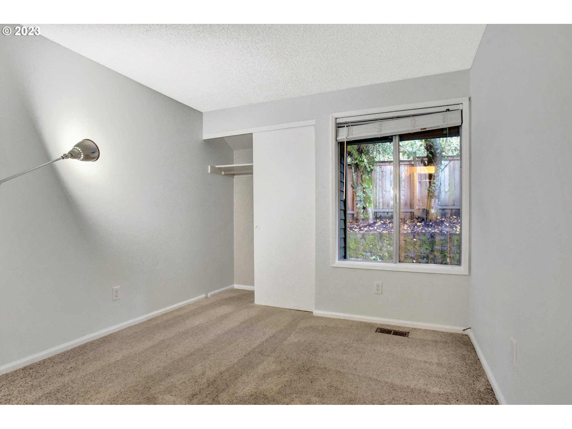 6160 Southwest Heights Lane Beaverton, OR 97007 - Photo 29 of 40 a view of an empty room with a window