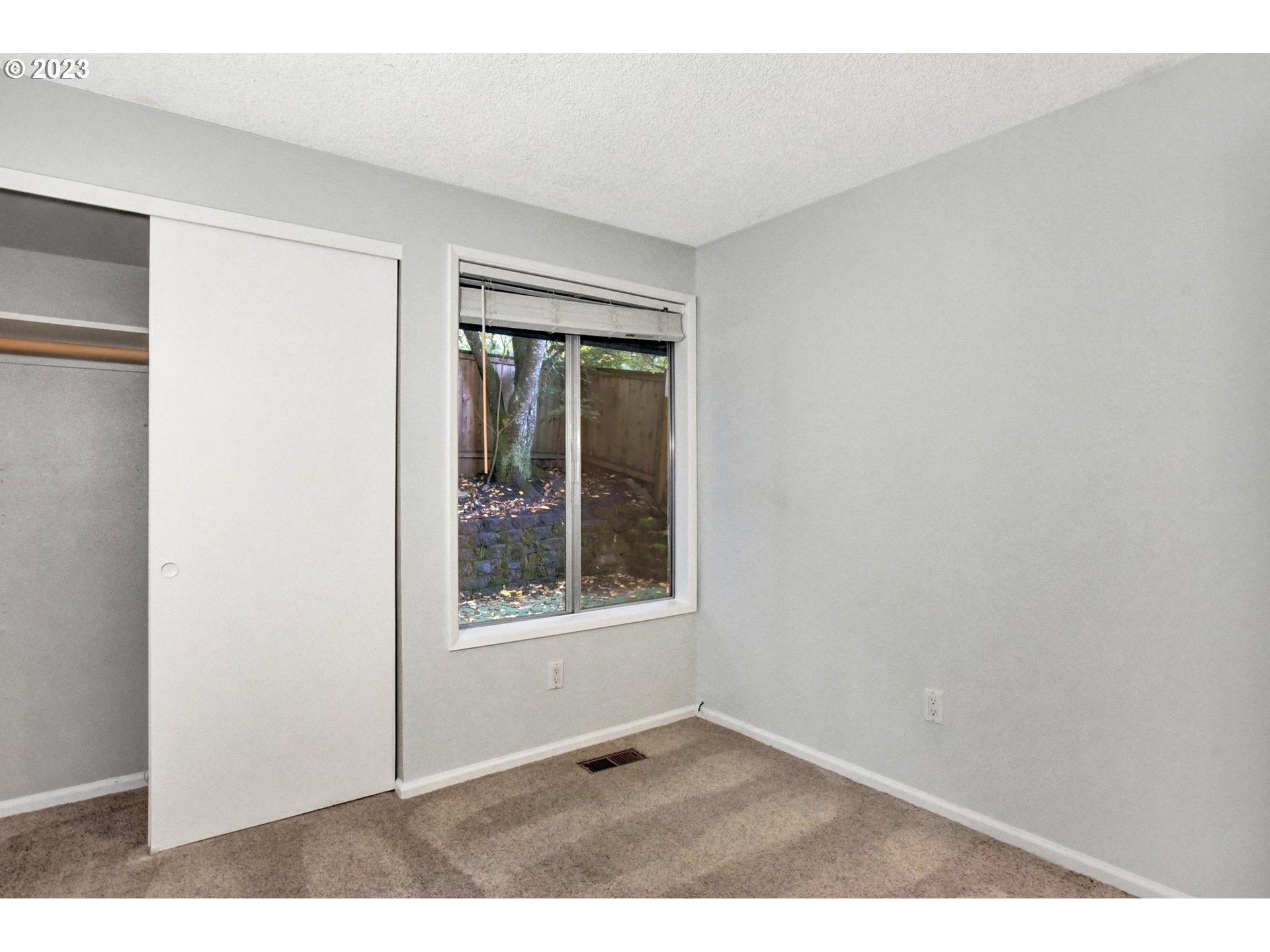6160 Southwest Heights Lane Beaverton, OR 97007 - Photo 30 of 40 a view of an empty room with a window
