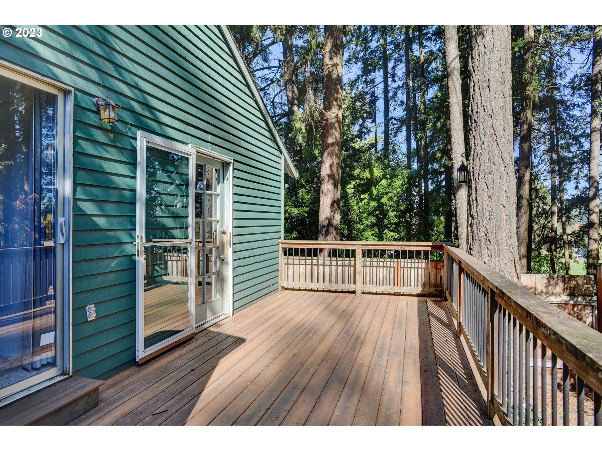 6160 Southwest Heights Lane Beaverton, OR 97007 - Photo 33 of 40 a view of balcony with wooden floor and fence