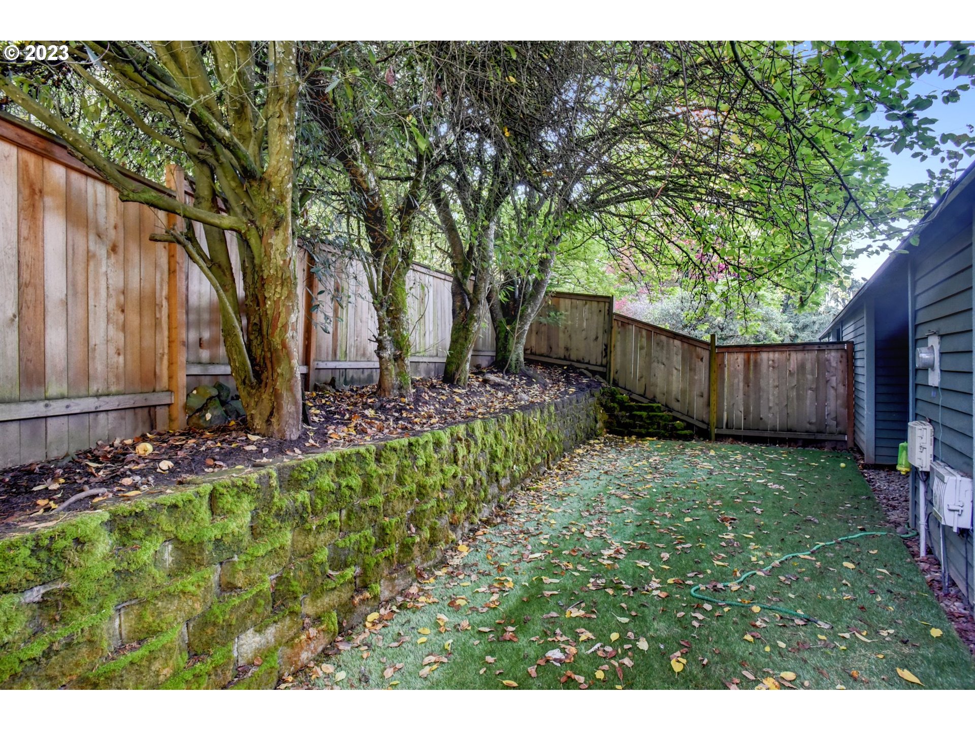6160 Southwest Heights Lane Beaverton, OR 97007 - Photo 39 of 40 a backyard of a house with lots of green space