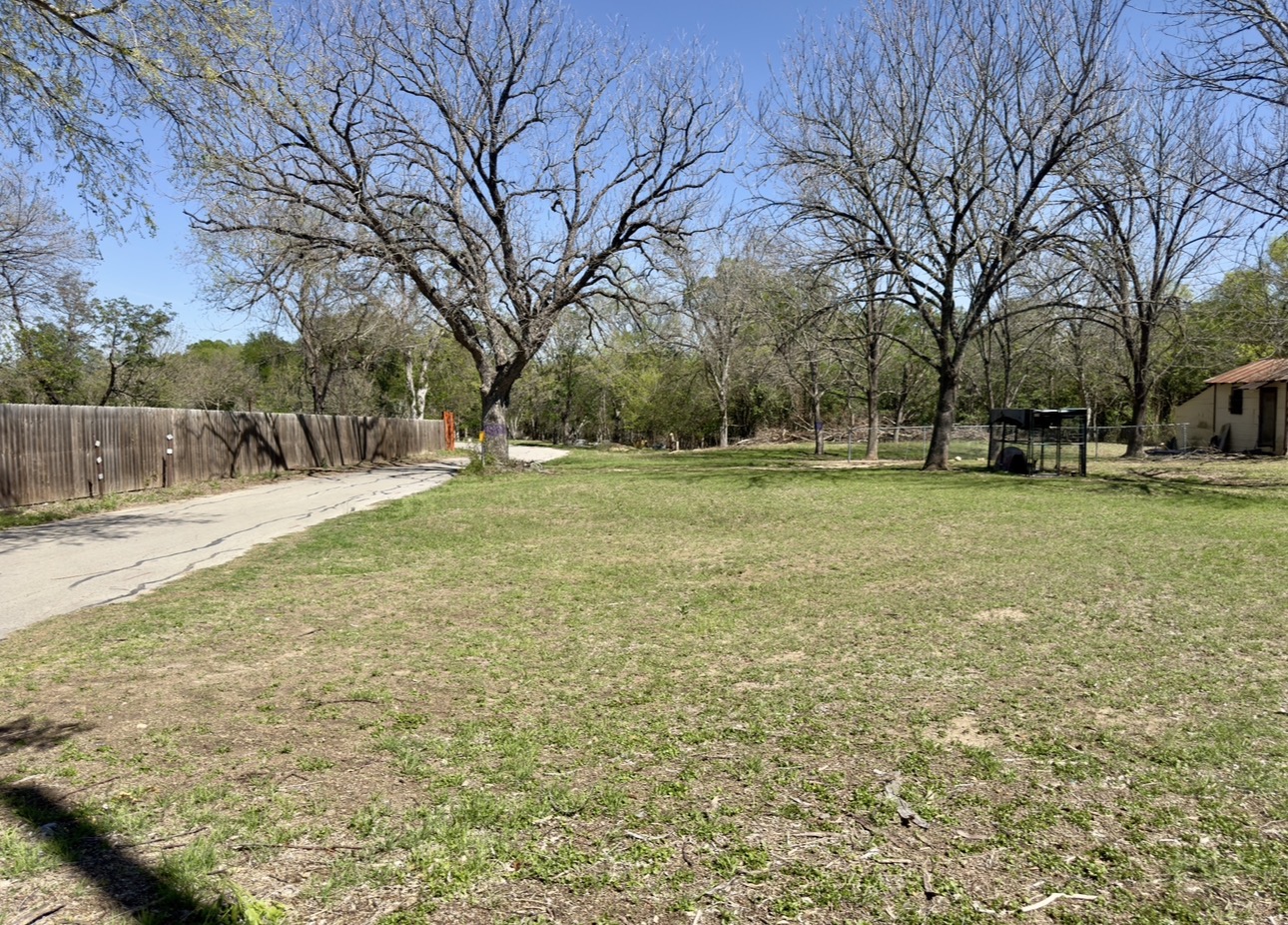 600 Sabine Street Lockhart, TX 78644 - Photo 1 of 19 a view of a field with trees