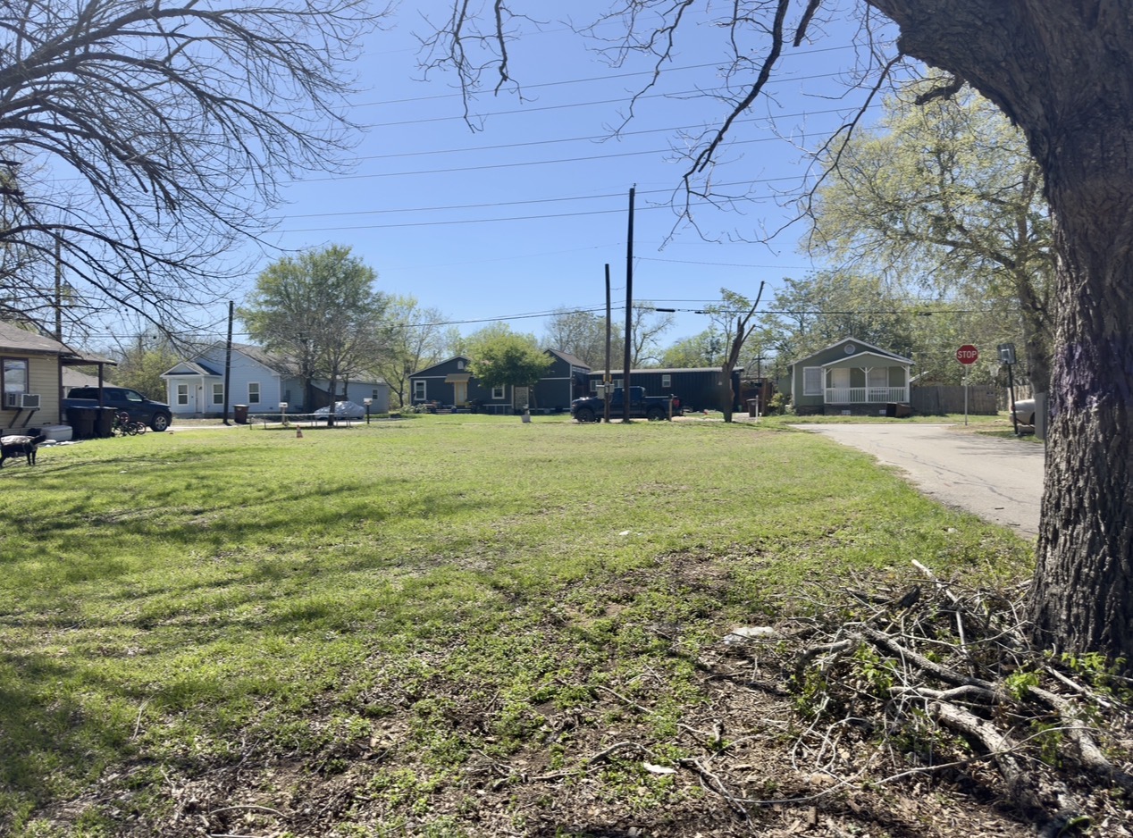 600 Sabine Street Lockhart, TX 78644 - Photo 11 of 19 a view of a backyard with large trees